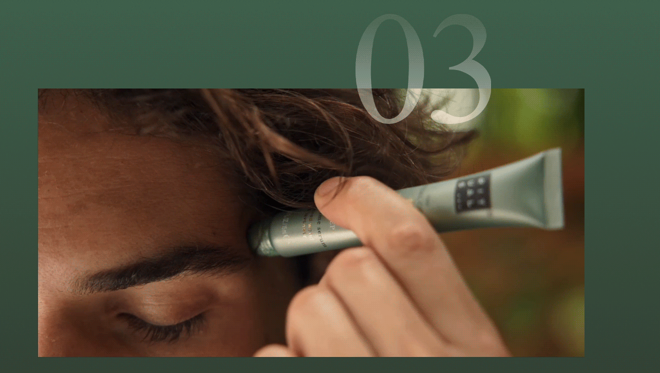 Close-up of finger applying serum near eye area