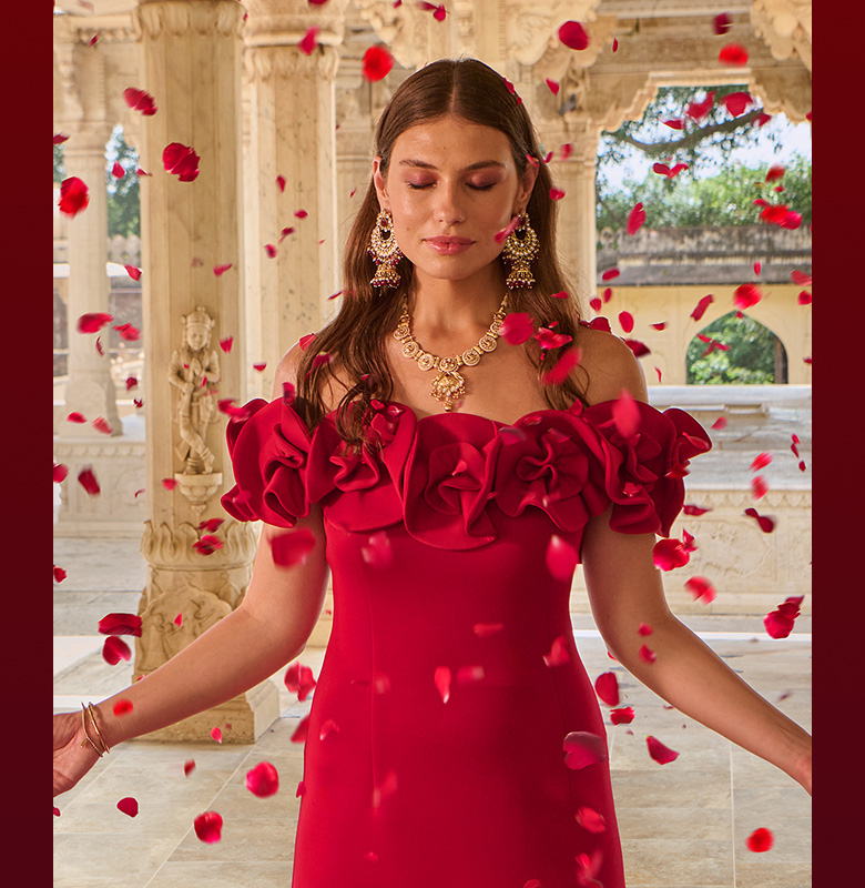 Woman surrounded by rose petals in the temple.