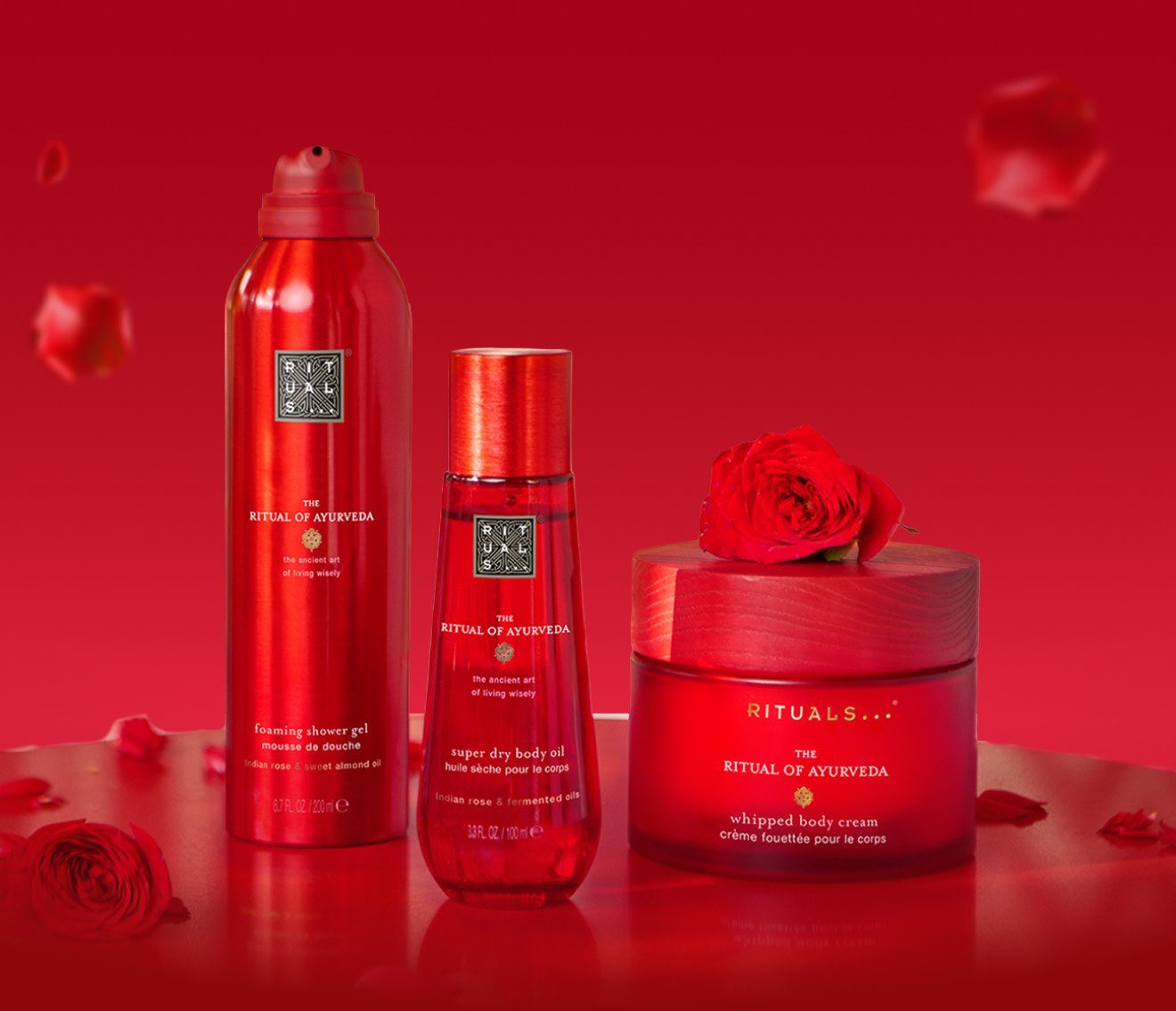Woman in a red dress representing The Ritual of Ayurveda collection.